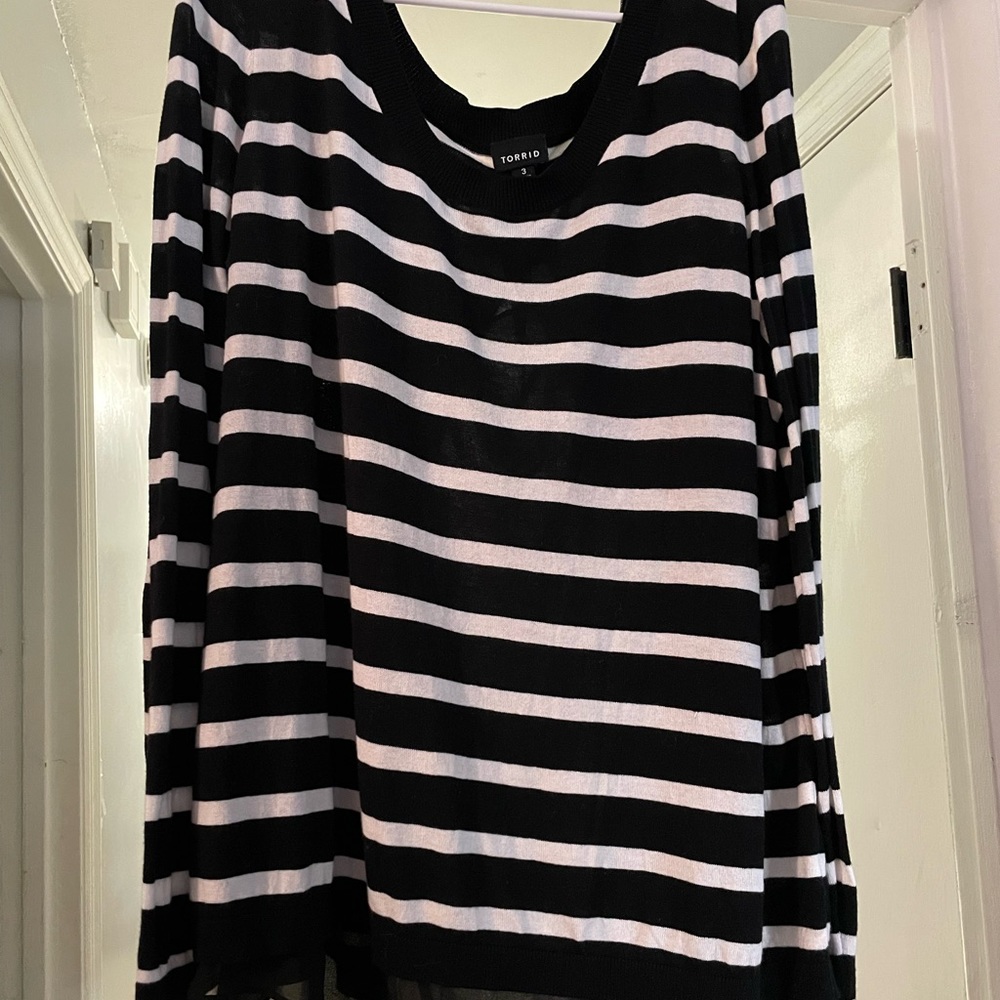Torrid black and white striped sweater with sheer peep through in back